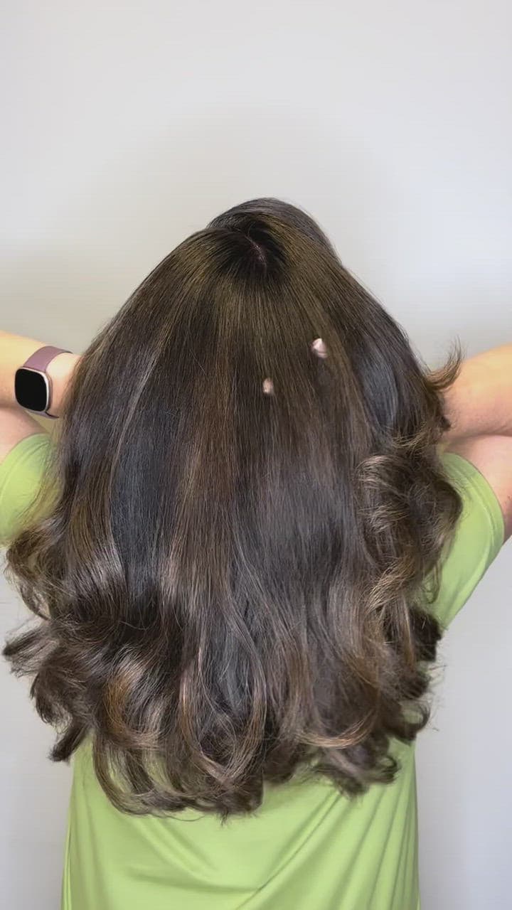 Glossy brunette waves in motion